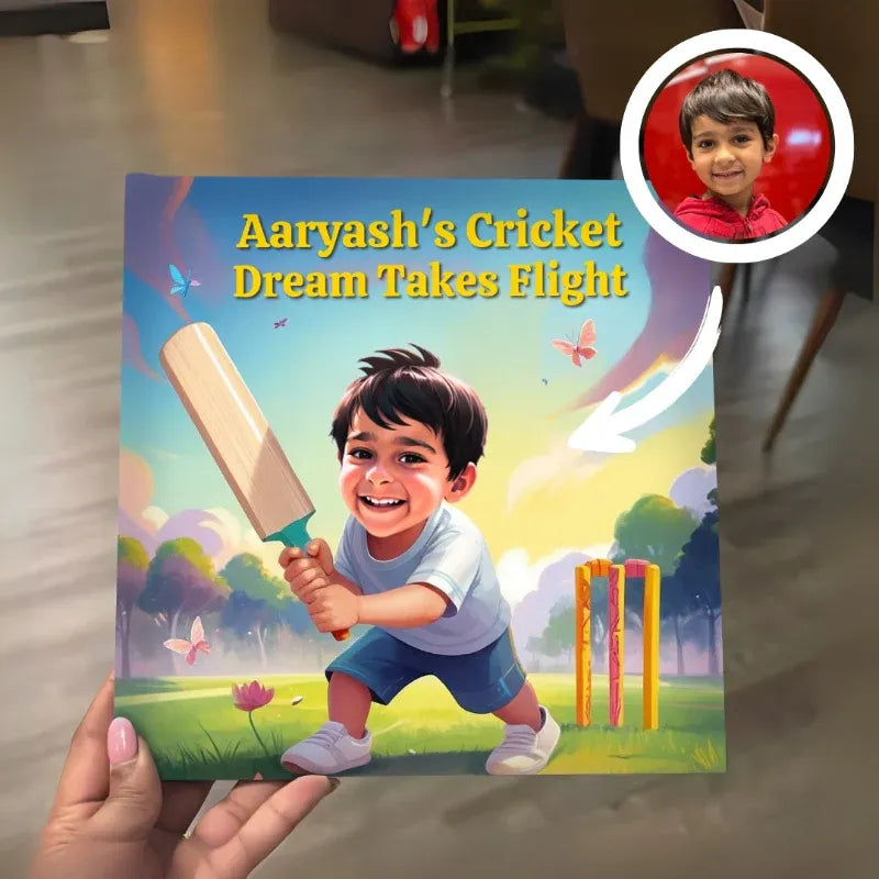 Cricket book for children titled 'Aaryash's Cricket Dream Takes Flight' held by a person, with a inset of a child's face.
