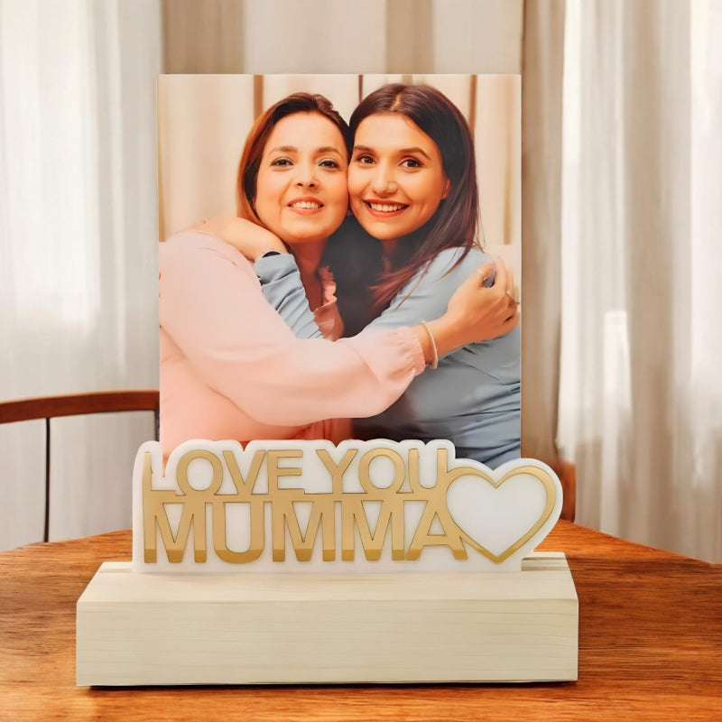 A personalized photo frame with the text 'LOVE YOU MUMMA' on the base, displaying a photo of a mother and her adult child.