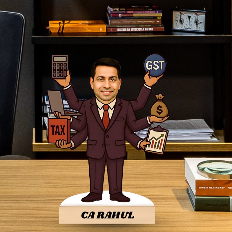 Statue of a man in a suit holding tax, GST, and money symbols on a desk with books in the background.