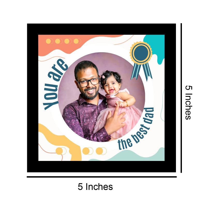 Framed photo of a man and a child with decorative text and graphics, showing dimensions.