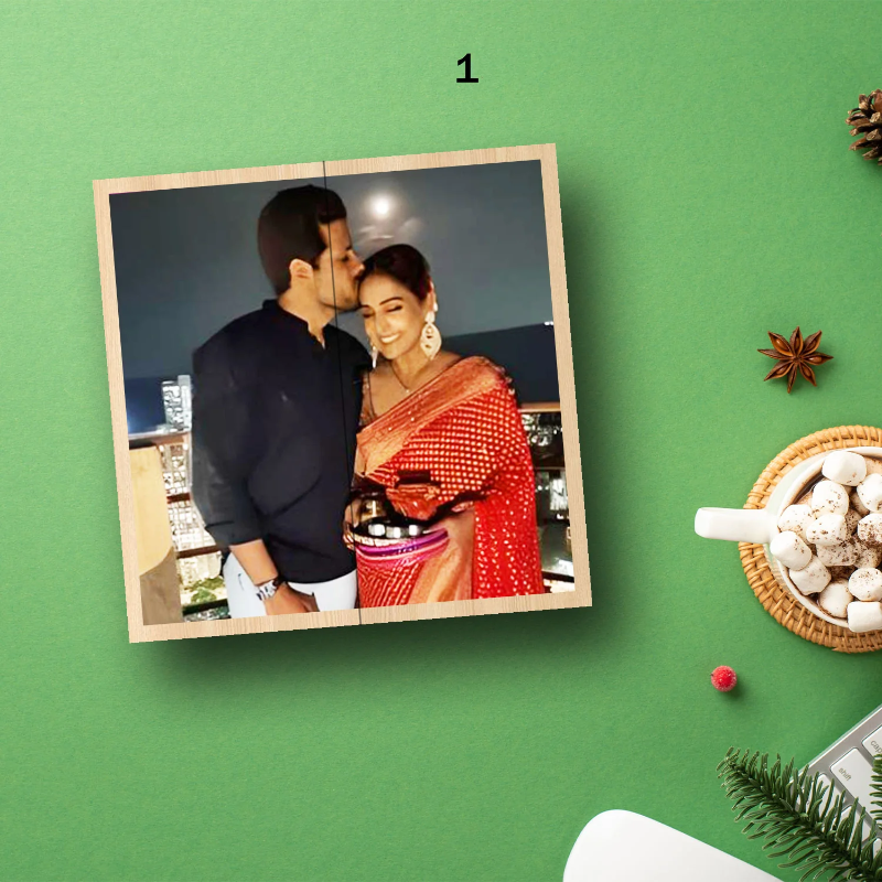 Wooden photo frame with a couple on a green background