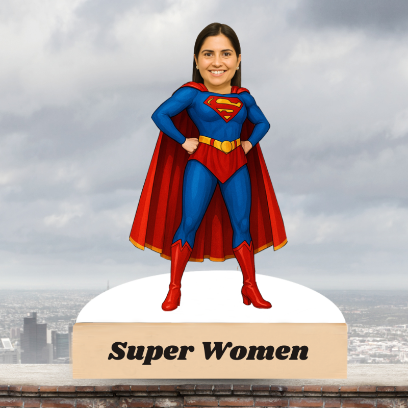 Person in Superman costume standing on a platform with 'Super Women' text against a cloudy sky.