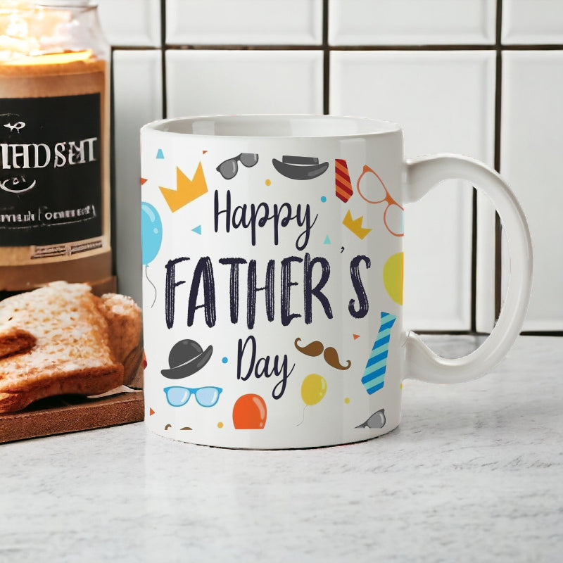 White mug with 'Happy Father's Day' text and colorful graphics on a kitchen counter.