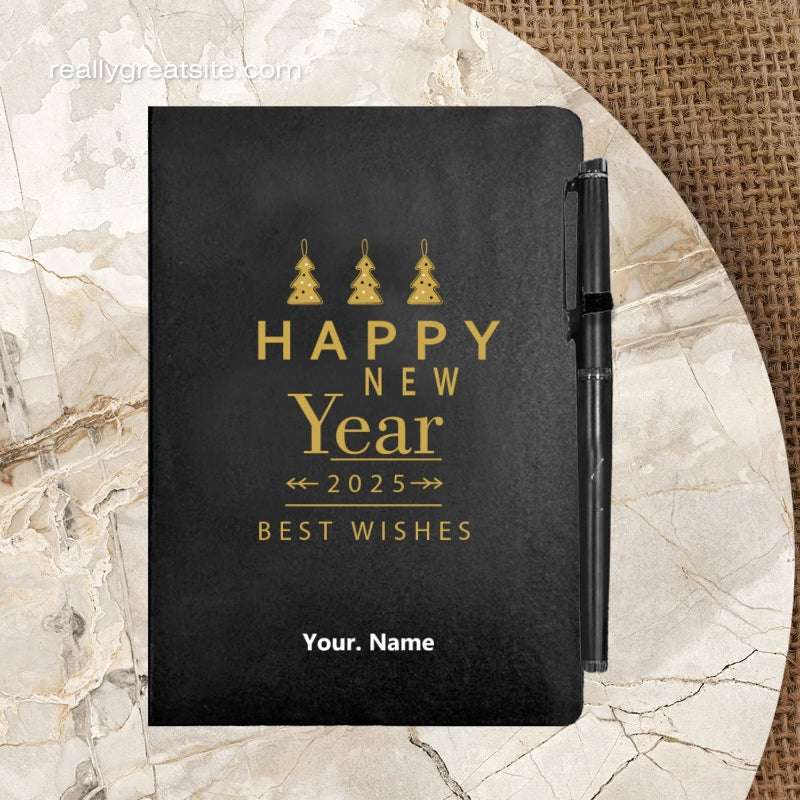 Black notebook with gold text 'Happy New Year 2025 Best Wishes' on a marble surface.