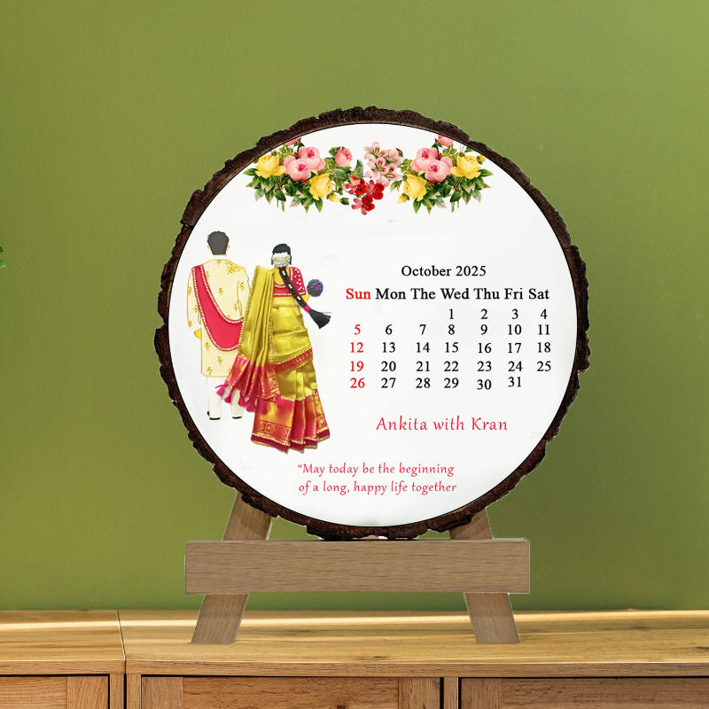 Round wooden calendar with floral design and illustrations of two people on a green background