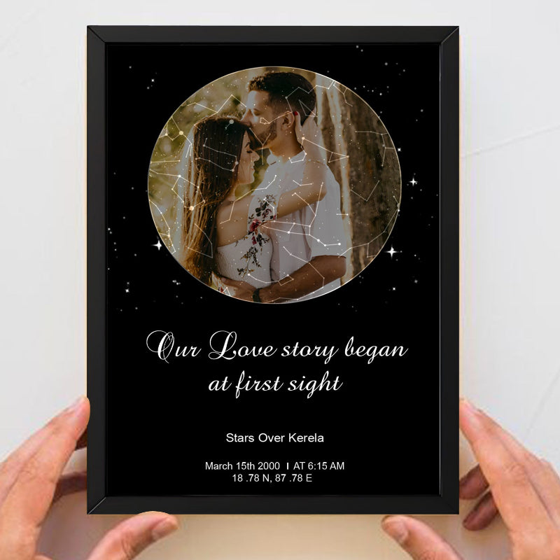 Framed photo of a couple with 'Our Love story began at first sight' text on a black background