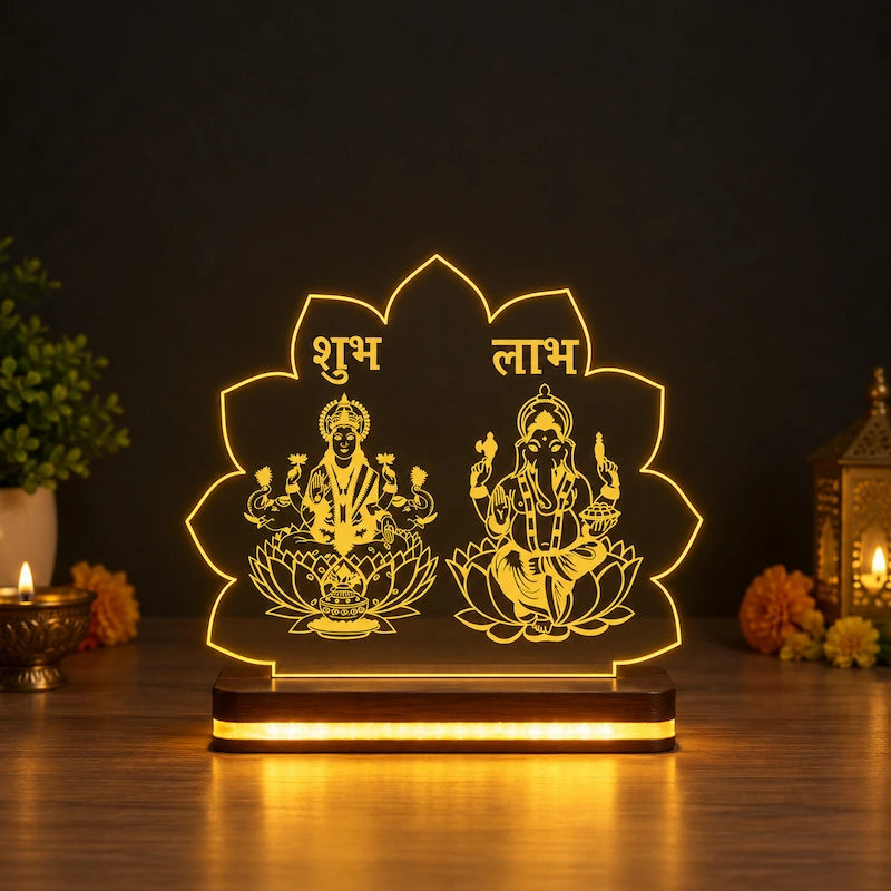 3D Illusion Laxmi Ganesh Lamp with Shubh Labh lotus-shaped acrylic panel glowing warm white on a dark base