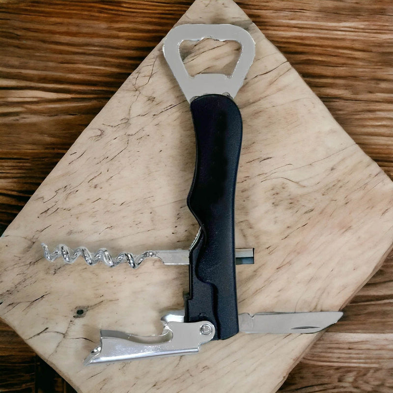 Multi-tool with bottle opener, corkscrew, and knife on a wooden surface
