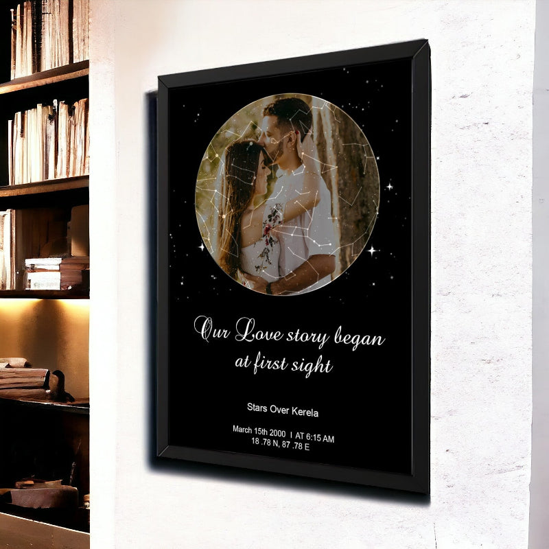 Framed photo of a couple with 'Our Love story began at first sight' text on a wall.