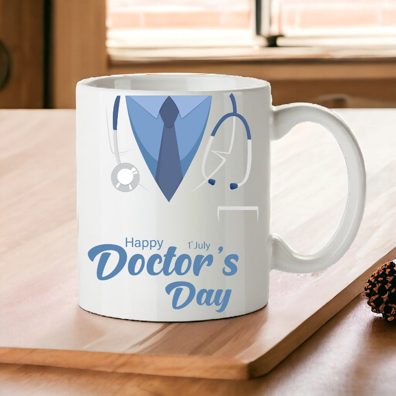 White mug with blue medical-themed design and 'Happy Doctor's Day' text on a wooden surface.