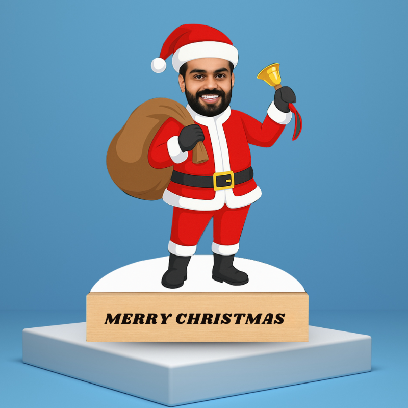 Santa Claus figurine with a sack and bell on a 'Merry Christmas' base against a blue background