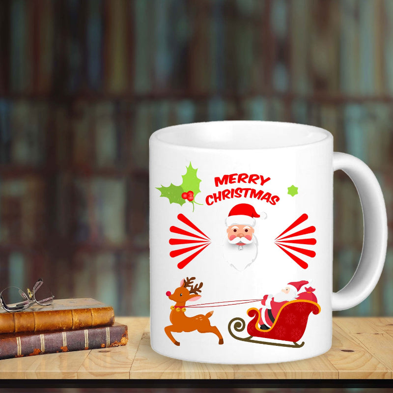 White mug with Christmas-themed design featuring Santa Claus, reindeer, and holly on a wooden surface.