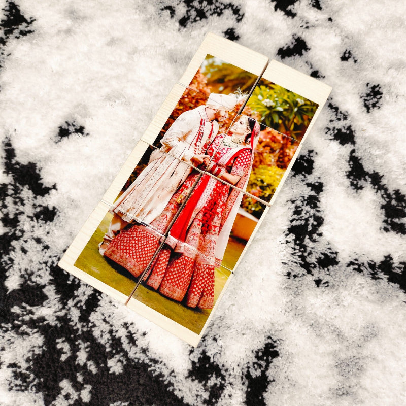 Vintage photograph of a couple in traditional attire on a textured white background
