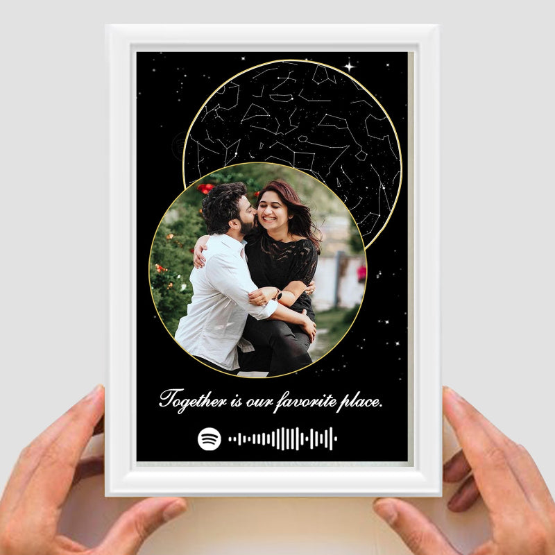 Framed artwork with a couple embracing, constellations, and 'Together is our favorite place' text.
