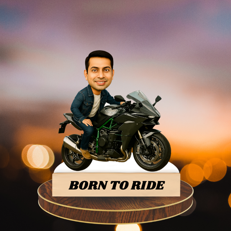 Bobblehead of a man on a motorcycle with 'Born to Ride' text against a blurred background
