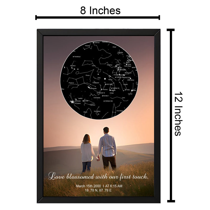 Framed artwork of a couple holding hands with a star map and dimensions displayed.