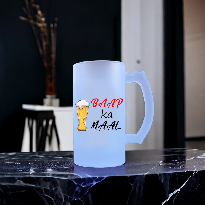 Frosted mug with text and beer graphic on a dark surface