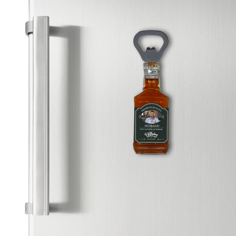 Magnetic bottle opener shaped like a bottle on a refrigerator door