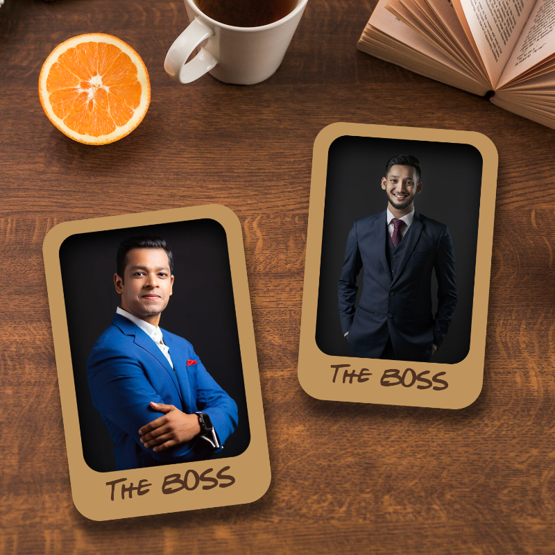 Two personalized photo fridge magnets. One with a man in a suit posing, and the other with a man in a suit sitting, both with text 'The Boss'.