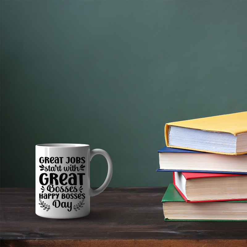 Mug with motivational quote on a table with books against a green chalkboard background