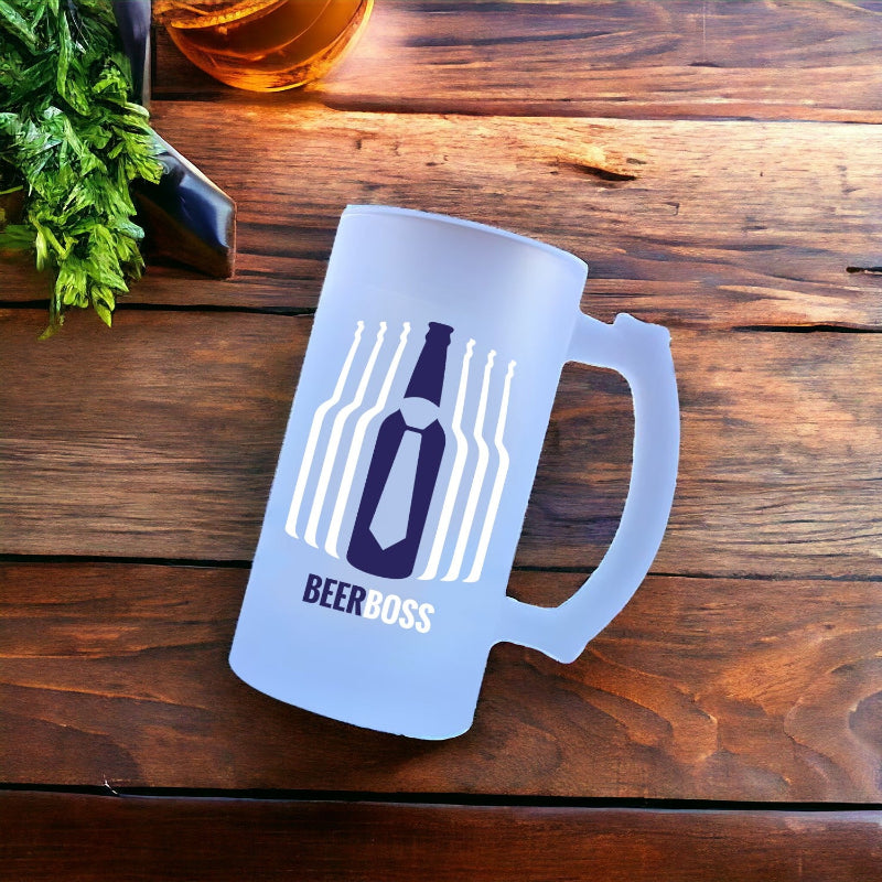 Frosted mug with 'BEERBOSS' logo on a wooden table with a glass of beer and mint leaves.