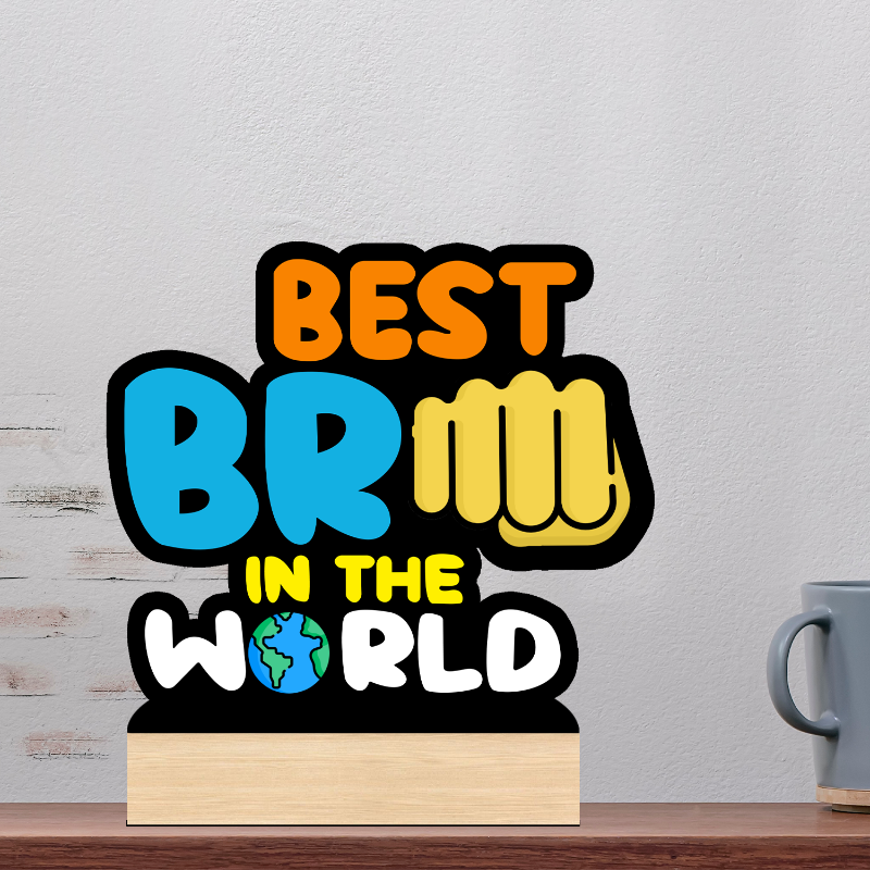Decorative sign with 'Best BFF in the World' text on a wooden stand against a light gray wall.