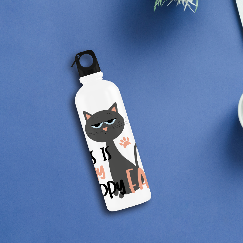 White water bottle with a cat design on a blue surface