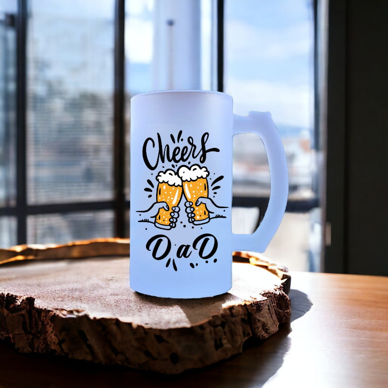 Light blue mug with 'Cheers D'aD' text and beer graphics on a wooden coaster.