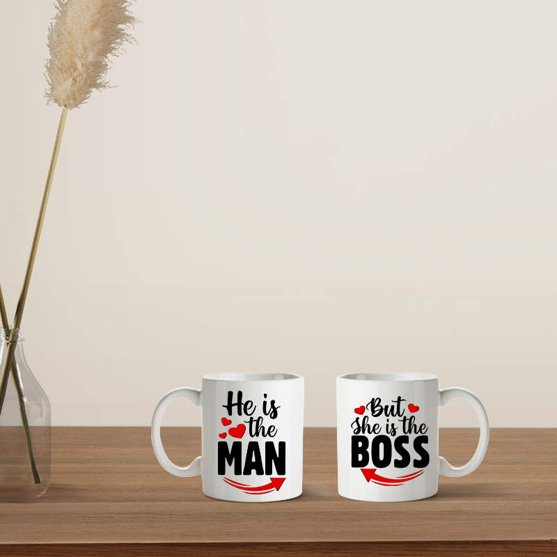 Two mugs with humorous text design on a wooden surface with decorative elements.