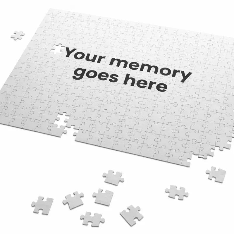 White jigsaw puzzle with 'Your memory goes here' text on a white background