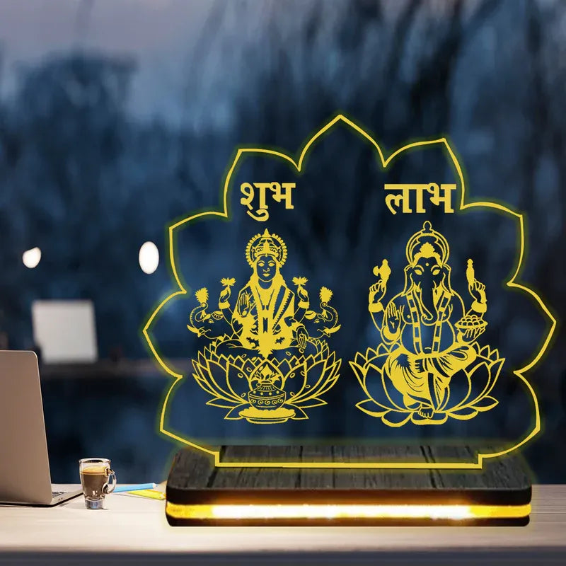 Decorative lamp with two deities on a table with a blurred background