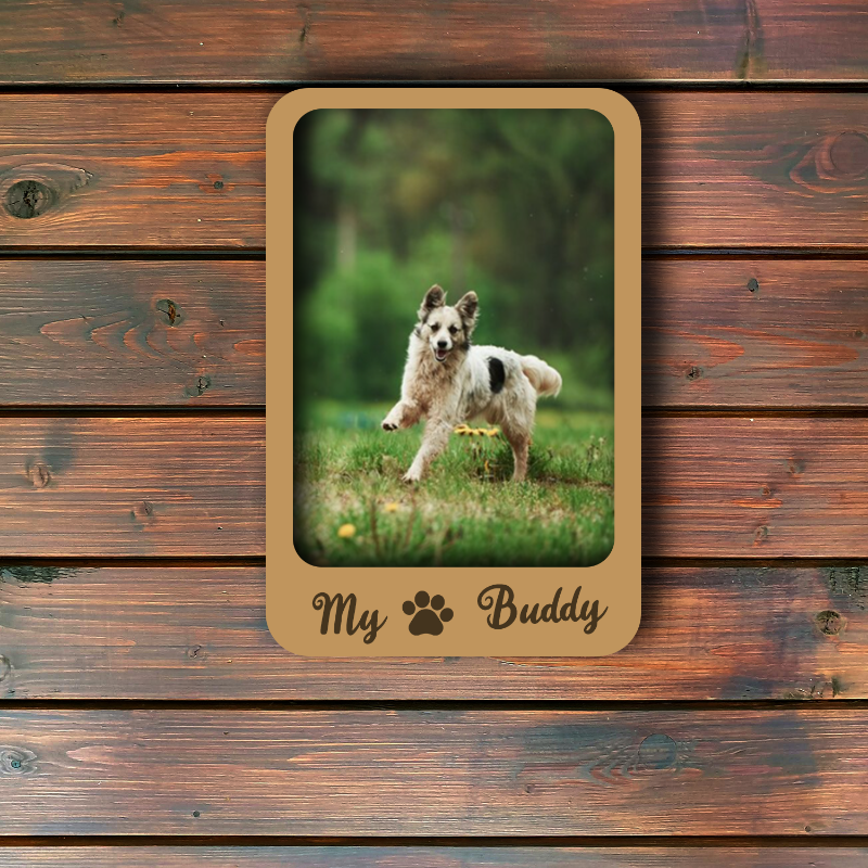 Wooden frame with a photo of a dog and 'My Buddy' text on a wooden background
