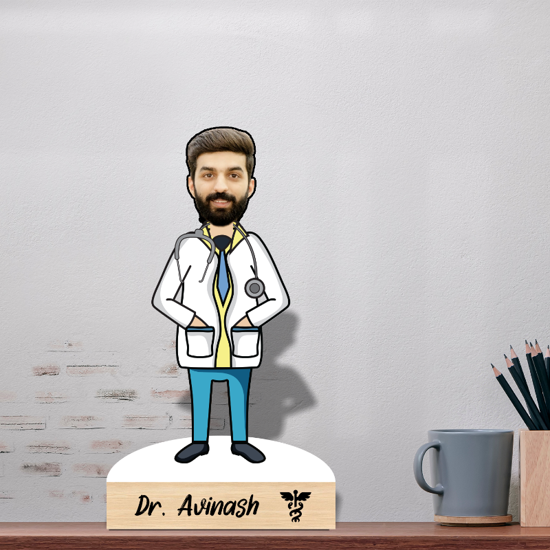 A personalized wooden caricature of a doctor with a beard, wearing a white coat, standing on a wooden base which includes a name and a small logo.