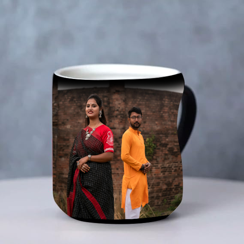 Mug with a printed design of a couple against a brick wall on a gray background