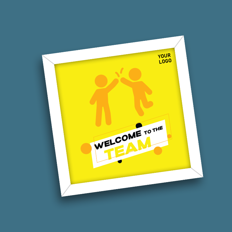 Framed poster with 'Welcome to the Team' text and stick figures on a yellow background.