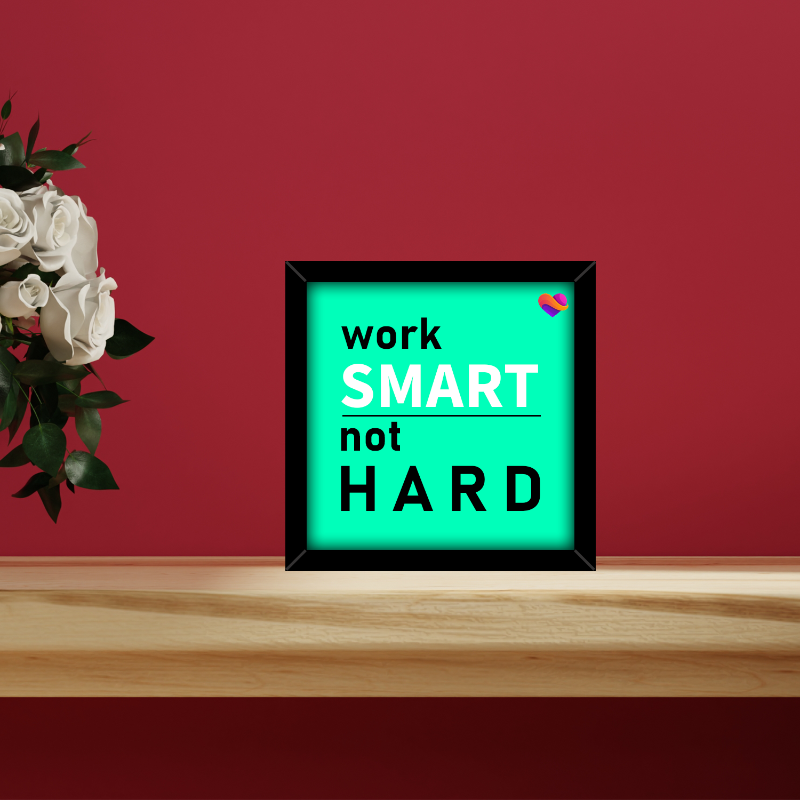 Framed motivational poster with 'work SMART not HARD' text on a red wall background