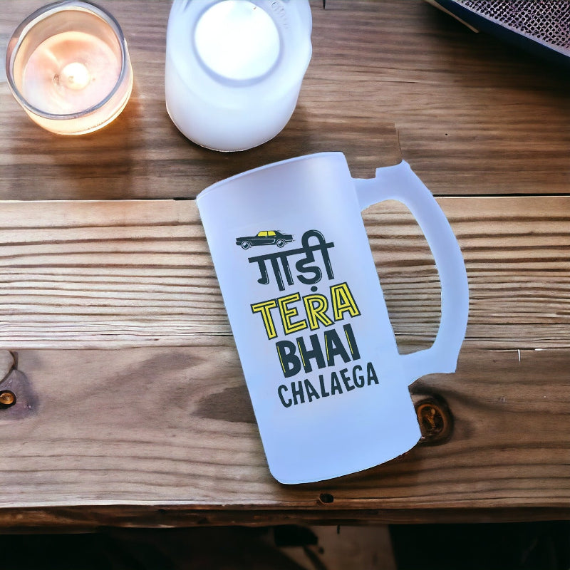 White mug with text on a wooden surface with candles in the background