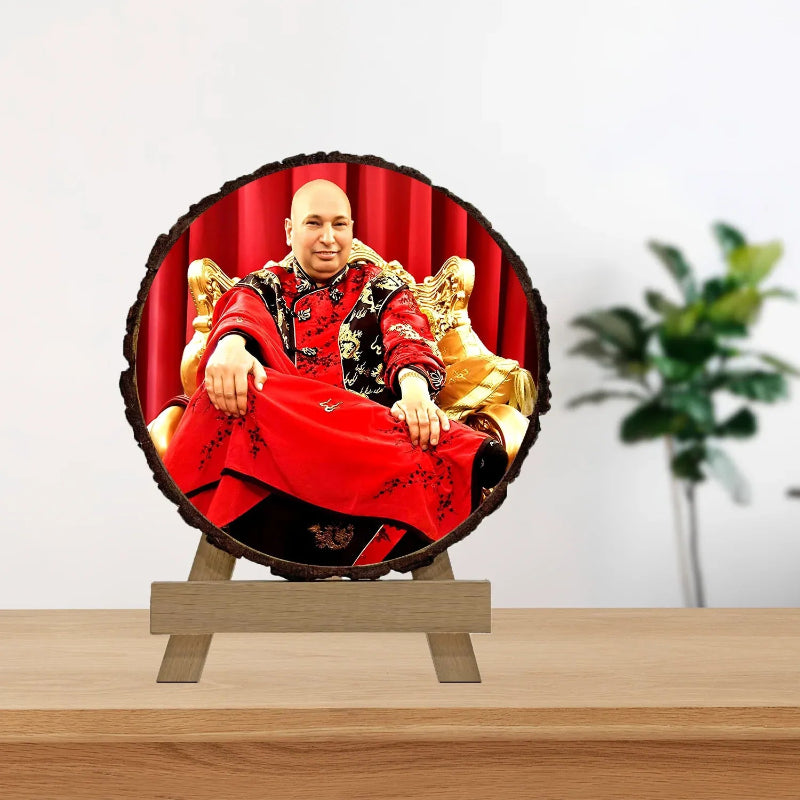 Decorative item with a person in red attire on a wooden stand against a white background