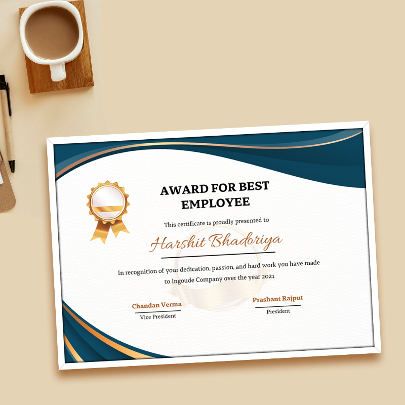 Award for best employee certificate on a desk with a cup of coffee