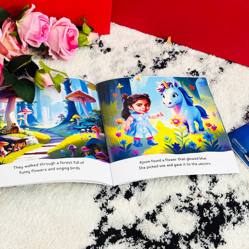 Open children's book with colorful illustrations of a girl and unicorn on a textured surface with flowers.