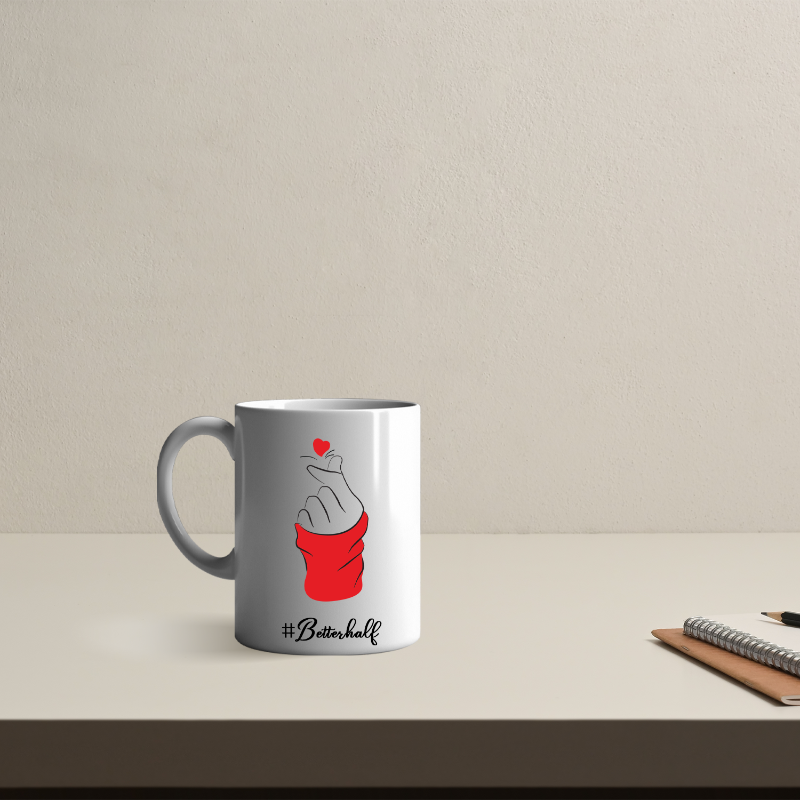 Gray mug with a red and white design on a beige surface