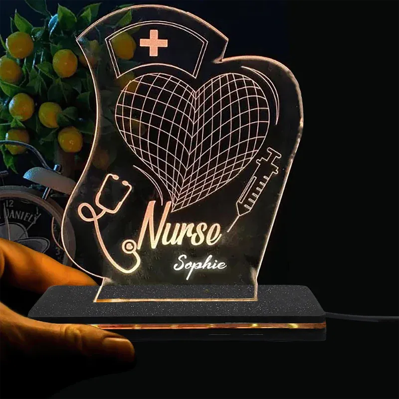LED lamp shaped like a nurse's cap with 'Nurse Sophie' text, held by a hand.