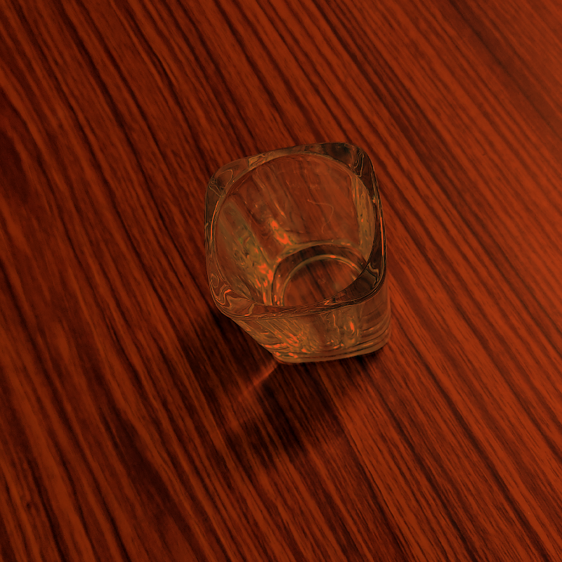 Clear glass object on a wooden surface