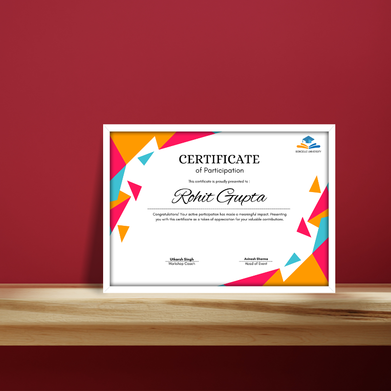 Framed certificate with colorful design on a wooden surface and red wall background