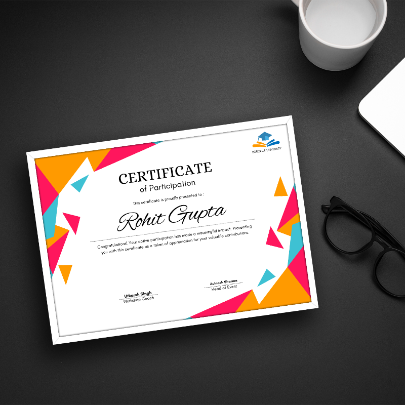 Colorful certificate of participation on a dark surface with a mug and glasses.