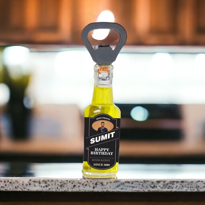 Bottle of Sumit Happy Birthday lager with a bottle opener on a bar counter.