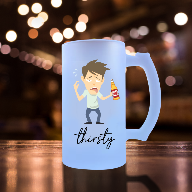 Blue mug with cartoon character and 'thirsty' text on a blurred bar background