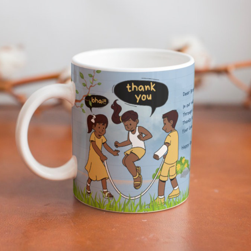 Mug with children playing and 'thank you' text on a wooden surface
