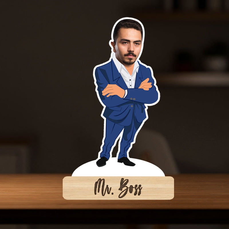 A caricatured boss figure with a wooden stand, dressed in a suit, positioned on a desk.