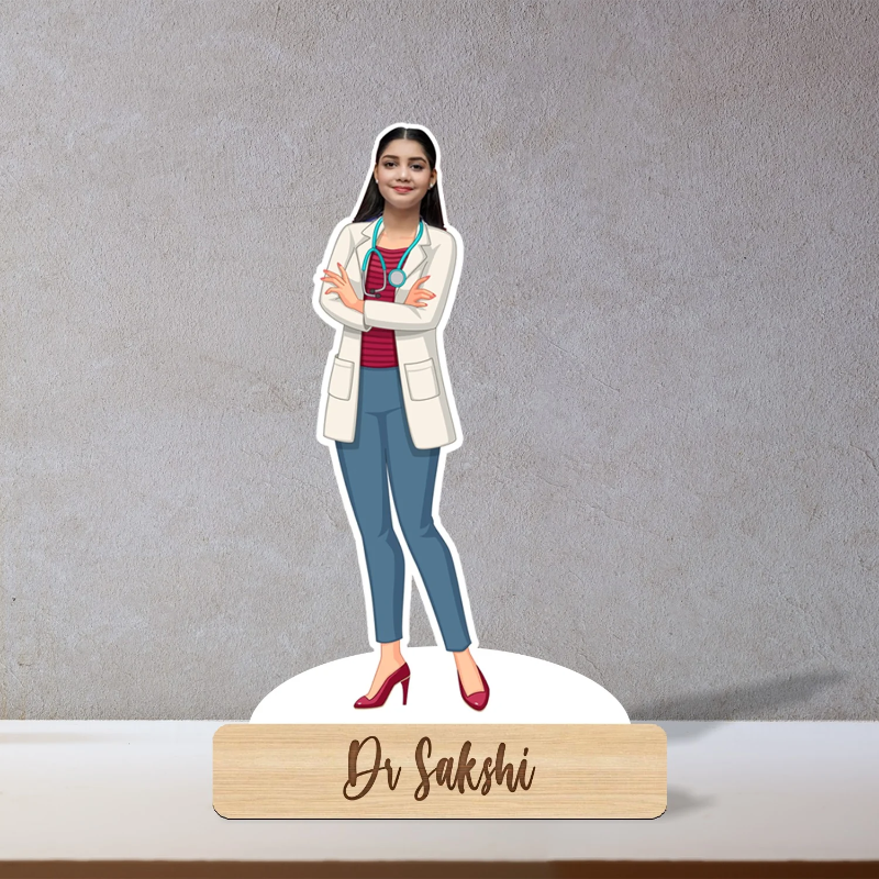 Cardboard cutout of a doctor with arms crossed on a gray background, featuring a nameplate at the bottom.